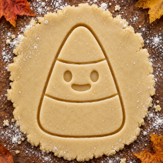 Happy Candy Corn imprint pressed into cookie dough