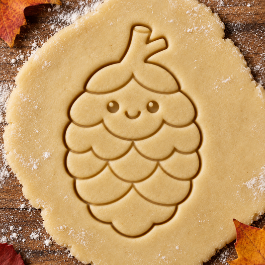 Autumn Pinecone imprint pressed into cookie dough