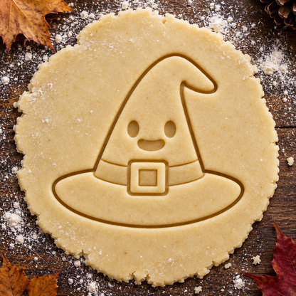 Friendly Witch Hat imprint pressed into cookie dough
